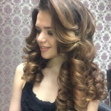 Прилади для завивки волосся: автоматичні апарати для створення локонів і хвиль в домашніх умовах