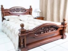 Різьблені ліжка (44 фото): моделі з масиву дерева, з різьбленим узголів’ям, дерев’яні двоспальні і односпальні моделі з різьбленням, дитячі ліжка