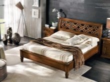 Різьблені ліжка (44 фото): моделі з масиву дерева, з різьбленим узголів’ям, дерев’яні двоспальні і односпальні моделі з різьбленням, дитячі ліжка