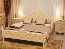 Різьблені ліжка (44 фото): моделі з масиву дерева, з різьбленим узголів’ям, дерев’яні двоспальні і односпальні моделі з різьбленням, дитячі ліжка