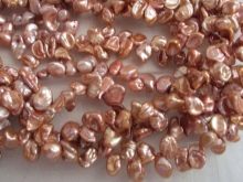 Рожевий перли: скільки коштує і з чим носити? Особливості каменю і його магічні властивості