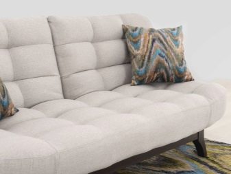 Розкладні дивани без підлокітників: моделі шириною 120, 130 і 140 см, маленькі 100 і 110 см, переваги і недоліки