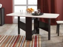 Розкладний обідній стіл-книжка для вітальні: як вибрати вузький стіл-трансформер для залу круглої і квадратної форми?