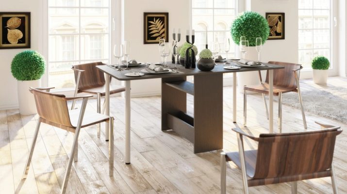 Розкладний обідній стіл-книжка для вітальні: як вибрати вузький стіл-трансформер для залу круглої і квадратної форми?