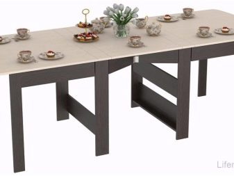 Розкладний обідній стіл-книжка для вітальні: як вибрати вузький стіл-трансформер для залу круглої і квадратної форми?