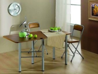 Розкладний обідній стіл-книжка для вітальні: як вибрати вузький стіл-трансформер для залу круглої і квадратної форми?