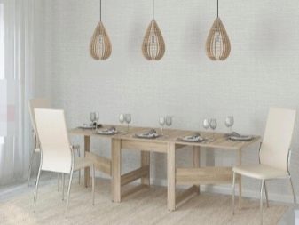 Розкладний обідній стіл-книжка для вітальні: як вибрати вузький стіл-трансформер для залу круглої і квадратної форми?