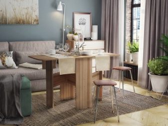 Розкладний обідній стіл-книжка для вітальні: як вибрати вузький стіл-трансформер для залу круглої і квадратної форми?