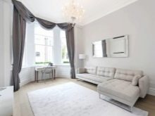 Сірі штори в інтер’єрі вітальні (60 фото): біло-сріблясті штори в залі, сіро-зелені, сіро-блакитні, сіро-бежеві комбінації в шторах