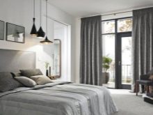 Сірі штори в спальні (63 фото): інтер’єр з синьо-сірими і світло-сірими фіранками, дизайн з темно-сірими і сіро-коричневими шторами, інші варіанти