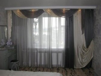 Сірі штори в спальні (63 фото): інтер’єр з синьо-сірими і світло-сірими фіранками, дизайн з темно-сірими і сіро-коричневими шторами, інші варіанти