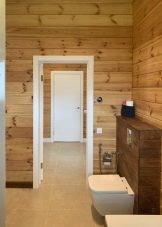 Санвузол у дерев’яному будинку (76 фото): дизайн кімнати в будинку з бруса на дачі, приклади обробки підлоги, схеми вентиляції