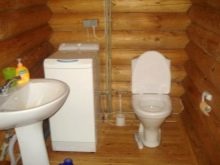 Санвузол у дерев’яному будинку (76 фото): дизайн кімнати в будинку з бруса на дачі, приклади обробки підлоги, схеми вентиляції