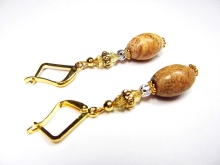 Сережки (143 фото): модні сережки 2020, які краще виглядають у вухах, моделі з полімерної глини, стильні сережки фріволіте і хрести