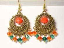 Сережки (143 фото): модні сережки 2020, які краще виглядають у вухах, моделі з полімерної глини, стильні сережки фріволіте і хрести