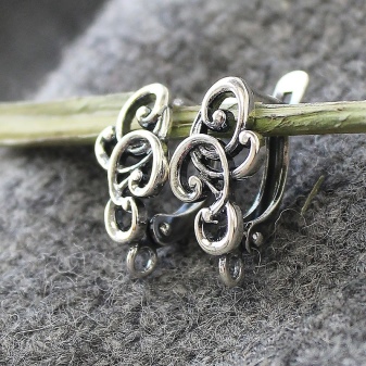 Сережки-біжутерія (68 фото): великі вечірні і великі повсякденні моделі, красиві і модні образи з люстрами