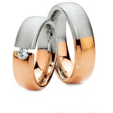 Широкі обручки (57 фото): гладкі парні моделі, оригінальні жіночі весільні кільця