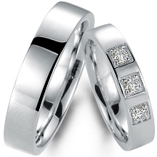 Широкі обручки (57 фото): гладкі парні моделі, оригінальні жіночі весільні кільця