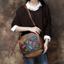 Шкіряні сумки ручної роботи (68 фото): вироби з натуральної шкіри, дизайнерські, авторські моделі