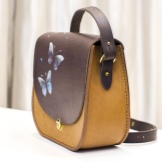 Шкіряні сумки ручної роботи (68 фото): вироби з натуральної шкіри, дизайнерські, авторські моделі