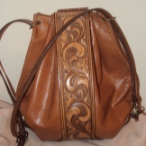 Шкіряні сумки ручної роботи (68 фото): вироби з натуральної шкіри, дизайнерські, авторські моделі