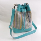 Шкіряні сумки ручної роботи (68 фото): вироби з натуральної шкіри, дизайнерські, авторські моделі