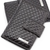 Шкіряні візитниці (61 фото): жіночі кишенькові моделі з логотипом з шкіри для пластикових і дисконтних карт