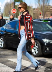 Шкіряний чокер (67 фото): модна прикраса з шкіри на шию, моделі з серцем і з шипами, з металевим декором