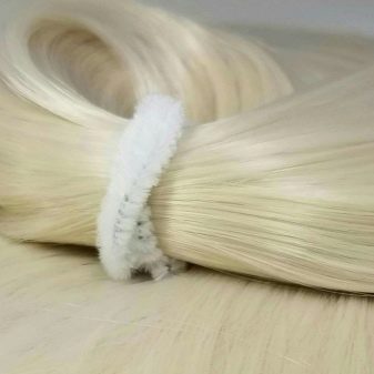 Штучні волосся (34 фото): як їх зробити, завити і укласти спреєм? Види накладних волосся на заколках. Як прибрати блиск з штучного волосся?
