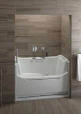 Сидячі акрилові ванни: огляд моделей з розмірами 120х70 см і 100х70 см, переваги і недоліки міні-ванн