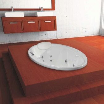 Сидячі акрилові ванни: огляд моделей з розмірами 120х70 см і 100х70 см, переваги і недоліки міні-ванн