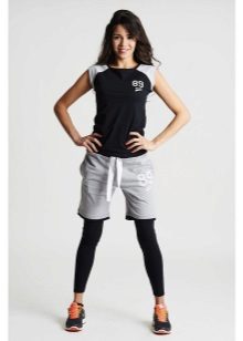Спортивні шорти (84 фото): короткі жіночі моделі для спорту, спідниця-шорти, обтягуючі, чорні, костюмом, трикотажні