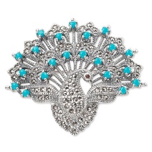 Срібні брошки (90 фото): моделі з натуральними каменями, з сапфіром, бурштином, перлами і хризопразом з срібла