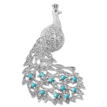 Срібні брошки (90 фото): моделі з натуральними каменями, з сапфіром, бурштином, перлами і хризопразом з срібла