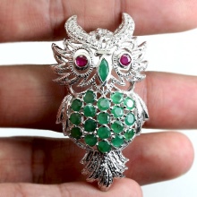 Срібні брошки (90 фото): моделі з натуральними каменями, з сапфіром, бурштином, перлами і хризопразом з срібла