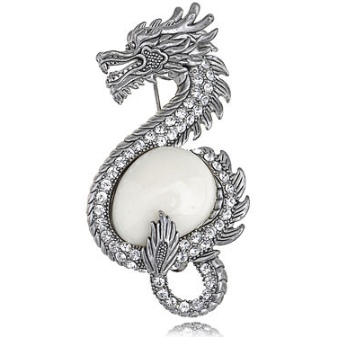 Срібні брошки (90 фото): моделі з натуральними каменями, з сапфіром, бурштином, перлами і хризопразом з срібла