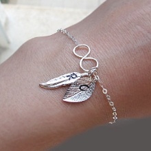 Срібні ланцюжки (112 фото): жіночі моделі на шию і на руку зі срібла з позолотою, 925 проби з кульками, як їх вибрати