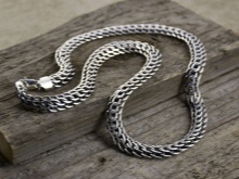 Срібні ланцюжки (112 фото): жіночі моделі на шию і на руку зі срібла з позолотою, 925 проби з кульками, як їх вибрати