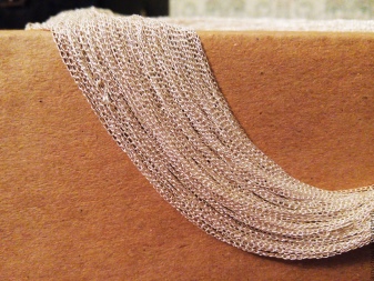 Срібні ланцюжки (112 фото): жіночі моделі на шию і на руку зі срібла з позолотою, 925 проби з кульками, як їх вибрати