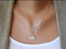 Срібні ланцюжки (112 фото): жіночі моделі на шию і на руку зі срібла з позолотою, 925 проби з кульками, як їх вибрати