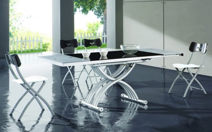 Стіл-трансформер для вітальні (62 фото): розкладні обідні круглі столи і розсувні столи-тумби, складні столи-консолі і інші моделі в зал