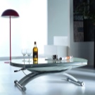 Стіл-трансформер для вітальні (62 фото): розкладні обідні круглі столи і розсувні столи-тумби, складні столи-консолі і інші моделі в зал