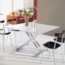 Стіл-трансформер для вітальні (62 фото): розкладні обідні круглі столи і розсувні столи-тумби, складні столи-консолі і інші моделі в зал