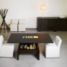 Стіл-трансформер для вітальні (62 фото): розкладні обідні круглі столи і розсувні столи-тумби, складні столи-консолі і інші моделі в зал