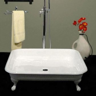 Сталеві душові піддони: емальовані піддони 800х800 мм, 70х70, 90х90 і 90х100 см, глибокі квадратні піддони із сталі і інші