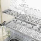 Сушарка для посуду у шафу: опис вбудованих кутових кухонних сушарок для тарілок та інших моделей