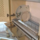 Сушарка для посуду у шафу: опис вбудованих кутових кухонних сушарок для тарілок та інших моделей