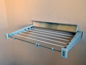 Сушарки для білизни на балкон (52 фото): підвісні та інші балконні пристосування для сушіння білизни, види білизняних вішалок на лоджію