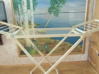 Сушарки для білизни на балкон (52 фото): підвісні та інші балконні пристосування для сушіння білизни, види білизняних вішалок на лоджію