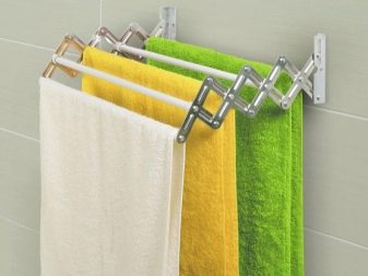 Сушарки для білизни у ванну кімнату: настінні і стельові, мотузки для сушіння і складні, ліани і вішалки. Особливості опускаються і розсувних моделей